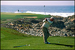 Picture: Golfer teeing off on oceanside golf course along the coast, Monterey Peninsula, California