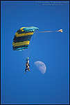 Picture: Tandem paragliders floating down past the moon, Tres Pinos, San Benito County, California