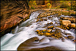 Photo: Cascade water over rocks in the Virgin River Narrows, Zion National Park, Utah