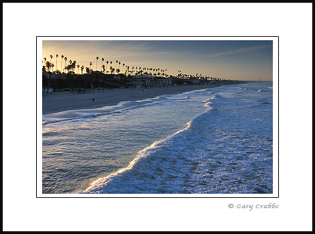 Morning ligh and breaking wave at Oceanside beach, San Diego County Coast, California