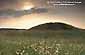 Sunset over ancient burial mound near Stonehenge, Salsbury Plain, England