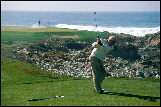 Picture: Golfer teeing off along the coast, Monterey Peninsula, California