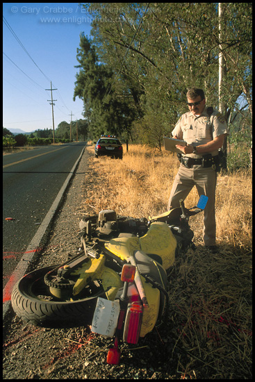 Picture: California Highway Patrol Officer investigating motorcycle accident, Napa County, California