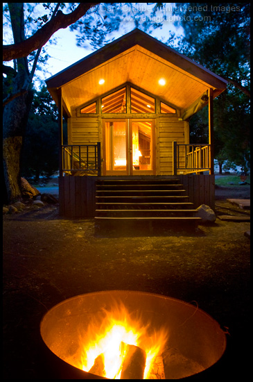 Picture: Rustic cabin and campfire, El Capitan Canyon Resort, California