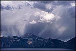 Photo: Sunlit rain storm and clouds over Mount Scott & Crater Lake, Crater Lake National Park, Oregon