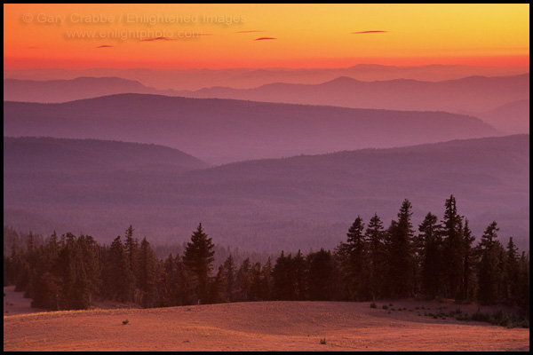 Photo: Golden sunset over forest and hills, Crater Lake National Park, Oregon