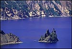 Picture: Tourist boat cruising around the Phantom Ship, Crater Lake National Park, Oregon