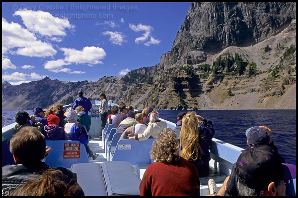 Photo: Sightseeing tourist cruising on a boat ride around Crater Lake, Crater Lake National Park, Oregon