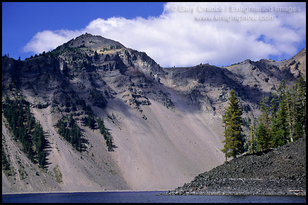 Photo: The steep volcanic slopes of crater walls and The Watchman, Crater Lake National Park, Oregon