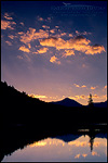 Picture: Clouds at sunrise reflected in the Tuolumne River, Tuolumne Meadows, Yosemite National Park, California