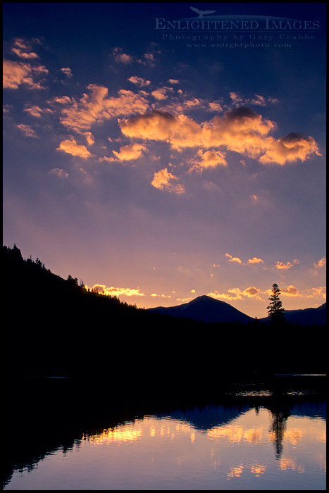 Picture: Clouds at sunrise reflected in the Tuolumne River, Tuolumne Meadows, Yosemite National Park, California