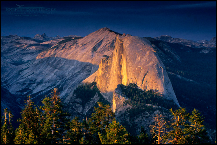 Picture: Sunset light through storm clouds on Half Dome and Clouds Rest from Glacier Point, Yosemite National Park, California