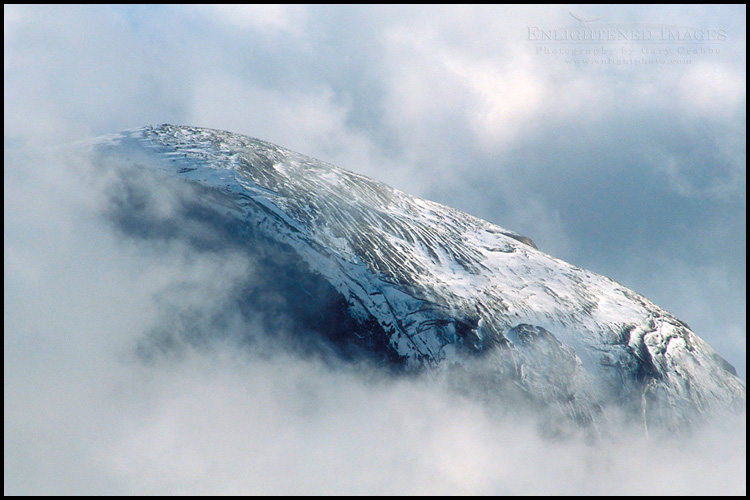 Photo: Fall storm clouds shroud the snow covered shoulder of Half Dome, Yosemite Valley, Yosemite National Park, California