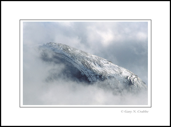 Photo: Summit ridge of Half Dome during winter snow storm, Yosemite National Park, California