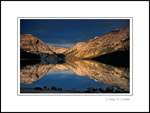 Picture: Stormy sunset light reflection in Tenaya Lake, Yosemite National Park, California