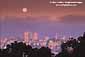 Moonset at dawn into fog over Russian Hill, San Francisco, California