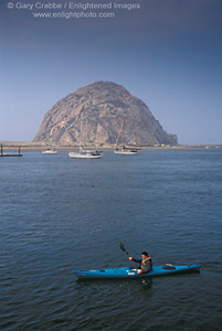 Kayaking below Morro Rock, in Morro Bay, Central Coast, California; Stock Photo photography picture image photograph fine art decor print wall mural gallery