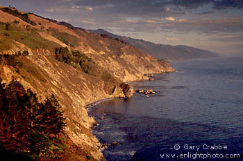 Sunset light on the coastal cliffs of the Pacific Ocean, Big Sur Coast, California