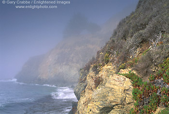 Fog along steep coastal cliffs of Big Sur, Monterey County, California