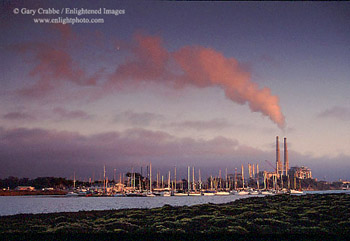 Sunset light on steam cloud over Elkhorn Slough and Moss Landing, Monterey County, California