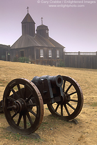 Cannon and church at Fort Ross State Historic Park, Sonoma Coast, California