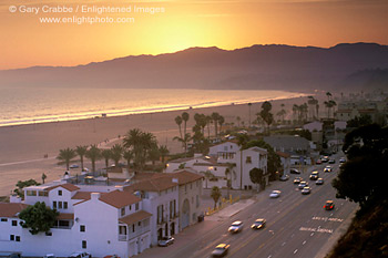 Sunset over the Pacific Coast Highway sand beach and mountains, Santa Monica, California