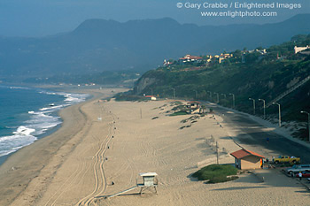 Santa Monica Mountains over sand shoreline at Point Dume State Beach, near Malibu, Los Angeles County Coast, Southern California