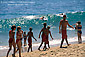 Kids walking on sand beach in summer class Junior Lifeguard Camp, Balboa Island, Newport Beach, California