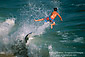 Boogie board surfer flying through air over ocean wave, Balboa Island, Newport Beach, Southern California Coast