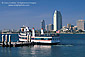 Ferry Boat on Coronado Island and Downtown San Diego as seen across San Diego Bay, San Diego, California