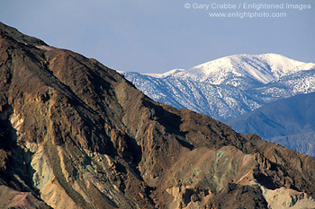 Snow-capped mountain and barren eroded hills, Death Valley National Park, California; Stock Photo image picture photo Phograph art decor print wall mural gallery