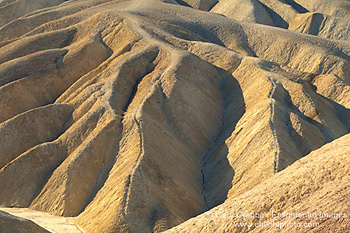 Eroded hills and runoff gullies at Zabriskie Point, Death Valley National Park, California; Stock Photo image picture photo Phograph art decor print wall mural gallery