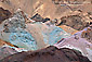 Colored rocks and minerals on eroded hillside at Artists Palette, Black Mountains, Death Valley National Park, California