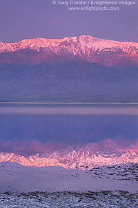 Sunrise light on Panamint mountains reflected in spring flood waters in desert basin, near Badwater, Death Valley National Park, California; Stock Photo image picture photo Phograph art decor print wall mural gallery