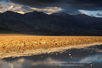 Golden sunset light on Devils Golf Course below the Black Mountains, Death Valley National Park, California; Stock Photo image picture photo Phograph art decor print wall mural gallery
