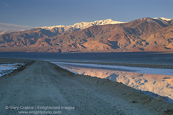Morning light on the Panamint Mountains above dirt West Side Road, Middle Basin, Death Valley National Park, California; Stock Photo image picture photo Phograph art decor print wall mural gallery