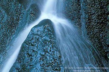 Flowing water split directions on rock at Darwin Falls, Darwin Canyon, Death Valley National Park, California; Stock Photo image picture photo Phograph art decor print wall mural gallery