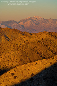 Sunrise light on hills and the distant Mount San Gorgonia peak from Keys View, Joshua Tree National Park, California