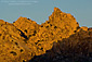 Sunset light on boulder rock peak outcrop, near Quail Springs, Joshua Tree National Park, California