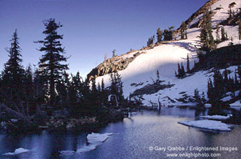 Summer snow at the edge of Half Moon Lake, Desolation Wilderness, near Lake Tahoe, California