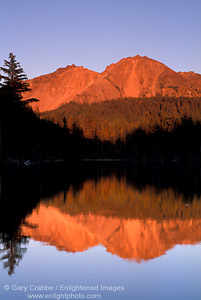Alpenglow on Chaos Crags at sunset reflected in Reflection Lake, Lassen Volcanic National Park, California; Stock Photo photography picture image photograph fine art decor print wall mural gallery