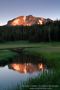 Sunrise light on Mount Lassen volcano reflected in water in Upper Meadow, Lassen Volcanic National Park, California; Stock Photo photography picture image photograph fine art decor print wall mural gallery