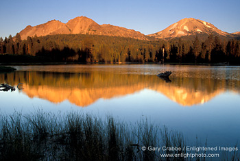 Chaos Crags and Mount Lassen at sunset reflected in Manzanita Lake, Lassen Volcanic National Park, California; Stock Photo photography picture image photograph fine art decor print wall mural gallery