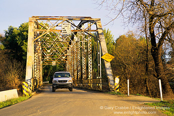 Narrow one lane cantalever bridge over Dry Creek, Sonoma County, California