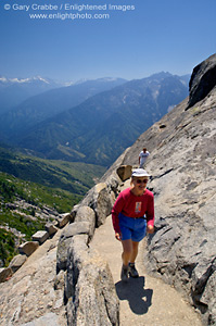 Female hiker hiking up trail to top of  Moro Rock, Sequoia National Park, California; Stock Photo photography picture image photograph fine art decor print wall mural gallery