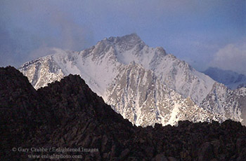 Sunlight on Lone Pine Peak during a winter storm, from the Alabama Hills, Eastern Sierra, California