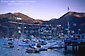 Picture: Sunset light on peaks above boats in Avalon Harbor, Avalon, Catalina Island, California