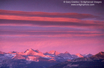 Alpenglow on clouds at sunset over the High Sierra, Yosemite National Park, California