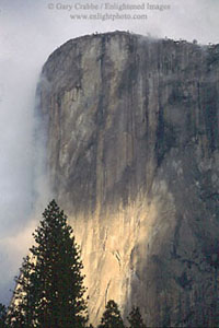 Sunlight through storm clouds on El Capitan, Yosemite Valley, Yosemite National Park, California