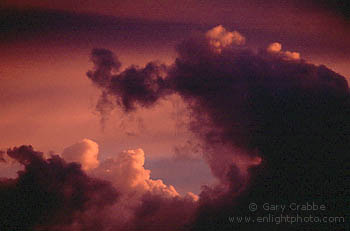 Red cumulus storm clouds at sunset